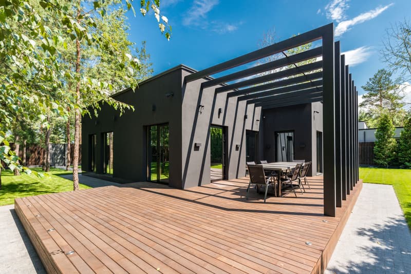 Steel-frame pergola over a wood deck